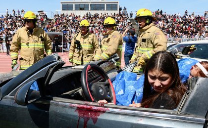 Lemoore High School and Every 15 Minutes, a lesson that keeps on teaching Victim are in pain as firefighters work to extract them from their vehicles.